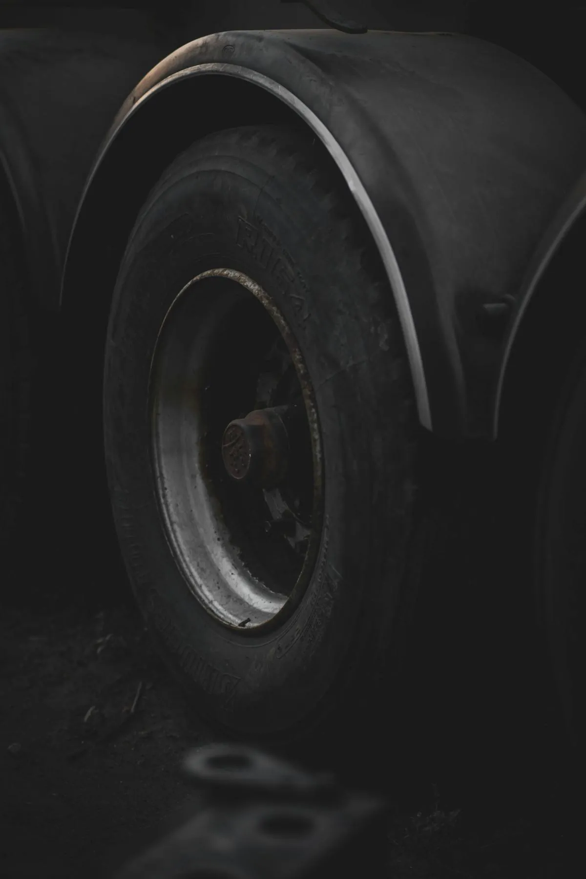 Close-up of a tyre and wheel on a car