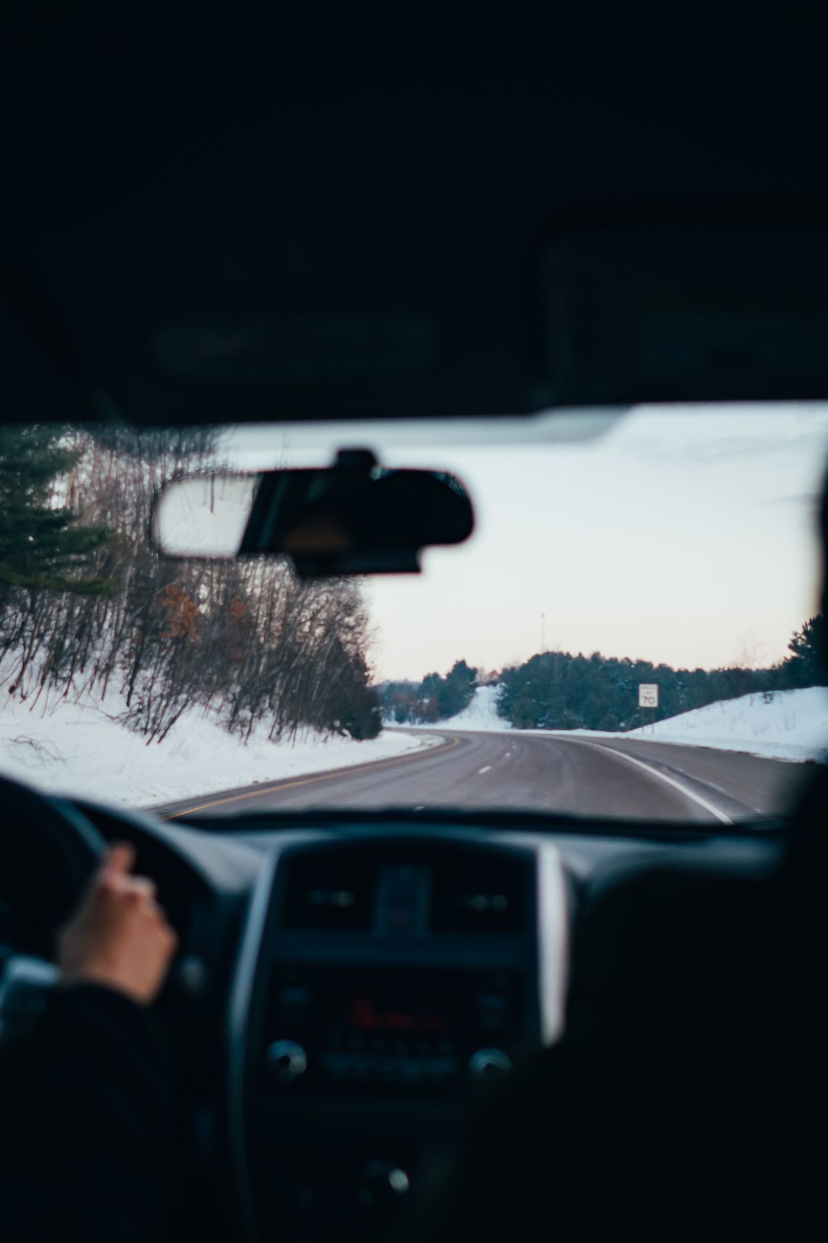A snowy highway illustrating the difference between summer and winter tyres