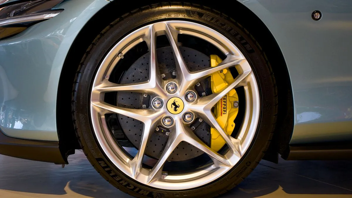 A driver feeling vibration through the steering wheel at speed